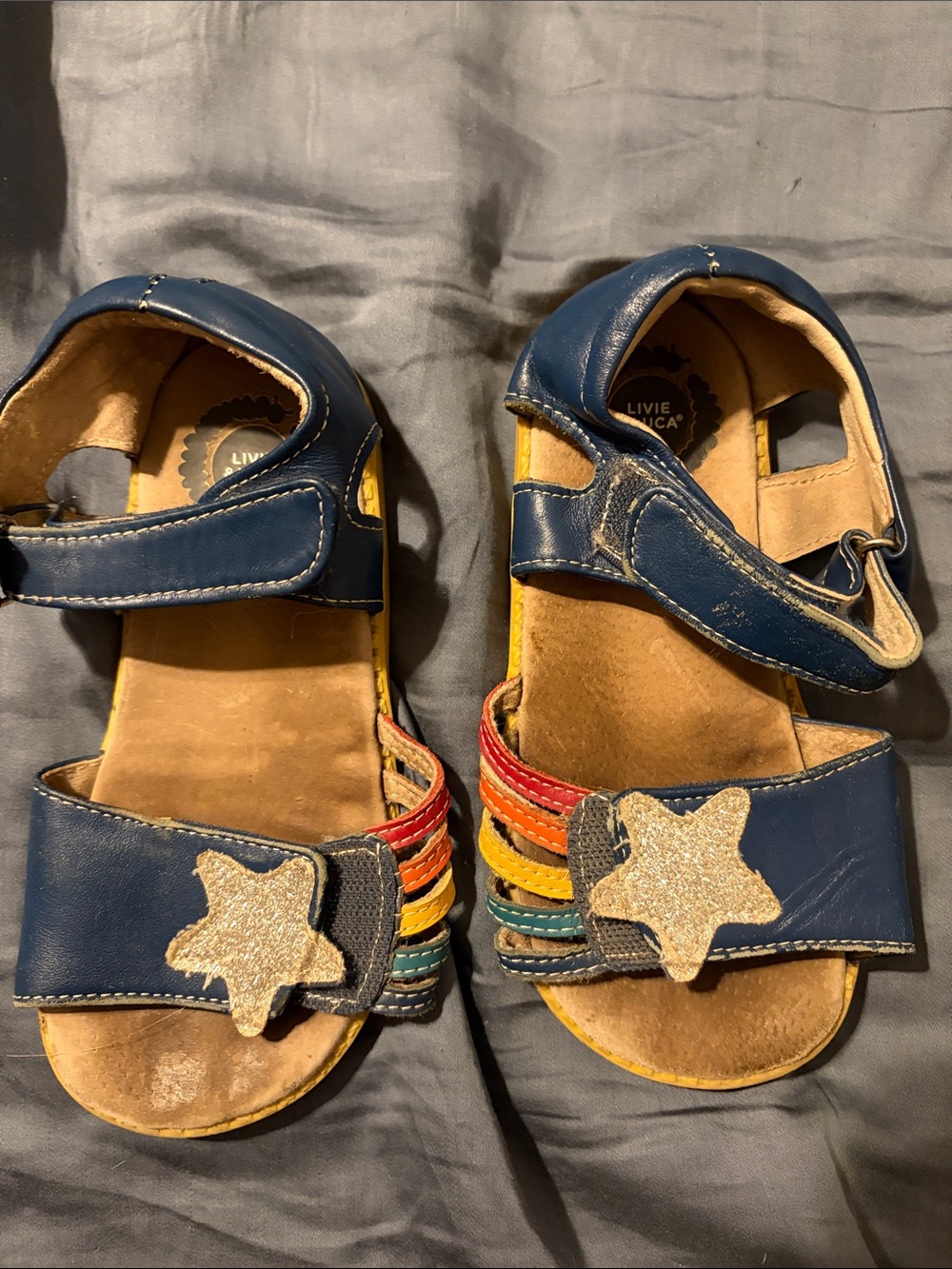 Livie & Luca Navy Leather Sandals with Rainbow Straps and Glitter Stars